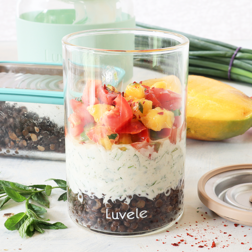 Yogurt raita lentil lunch bowl with mango salsa